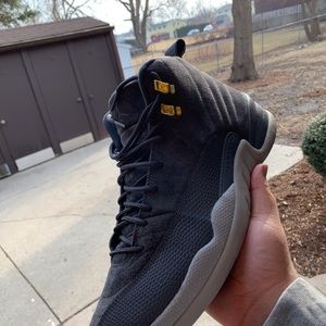 Dark gray Jordan 12s